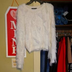 Beautiful white fuzzy sweater with feathers and pearls